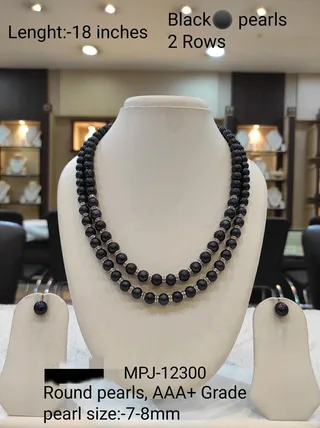 Black double strand pearl necklace with matching earrings