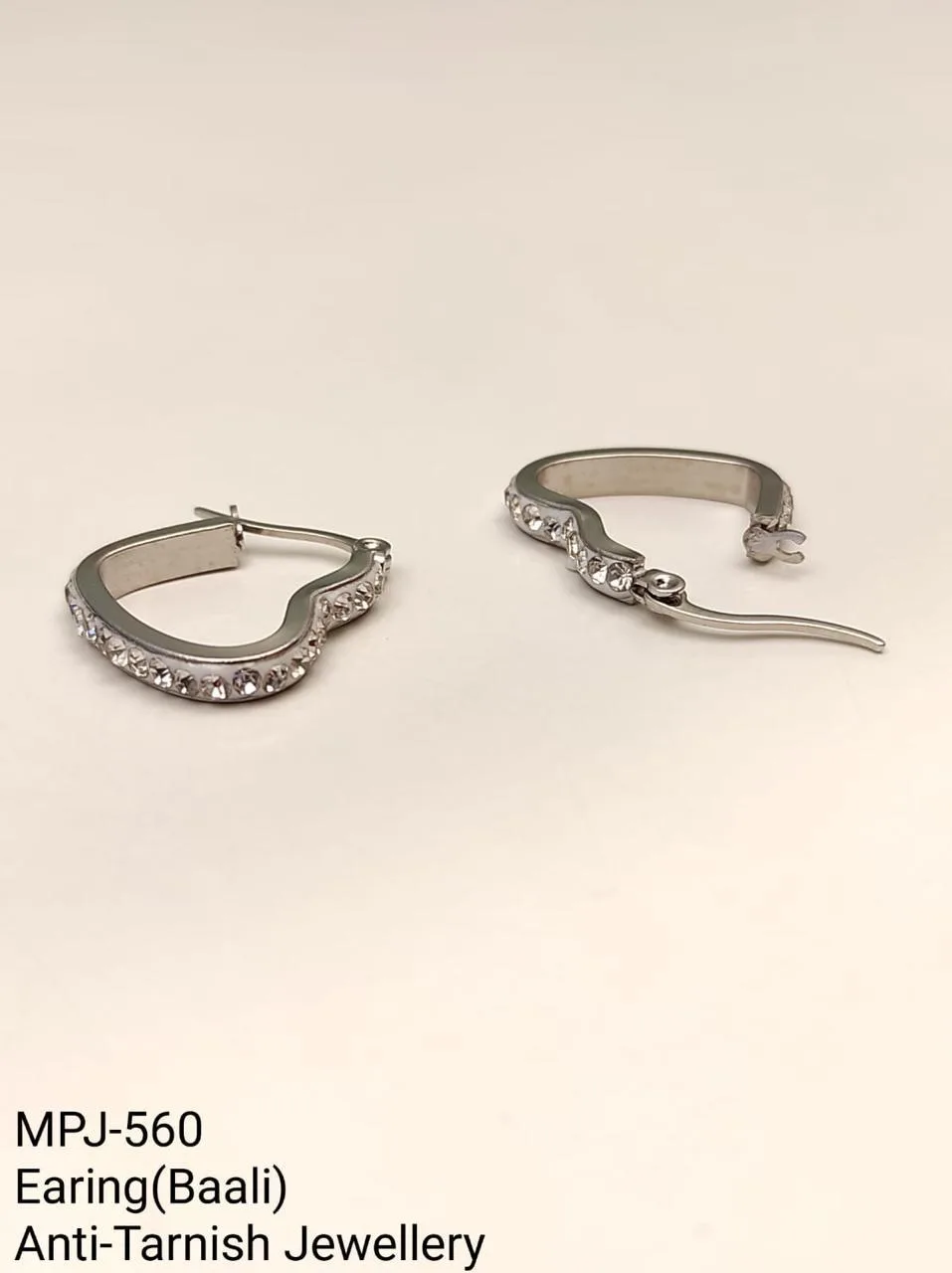 Silver — Hoop style earrings — Silver