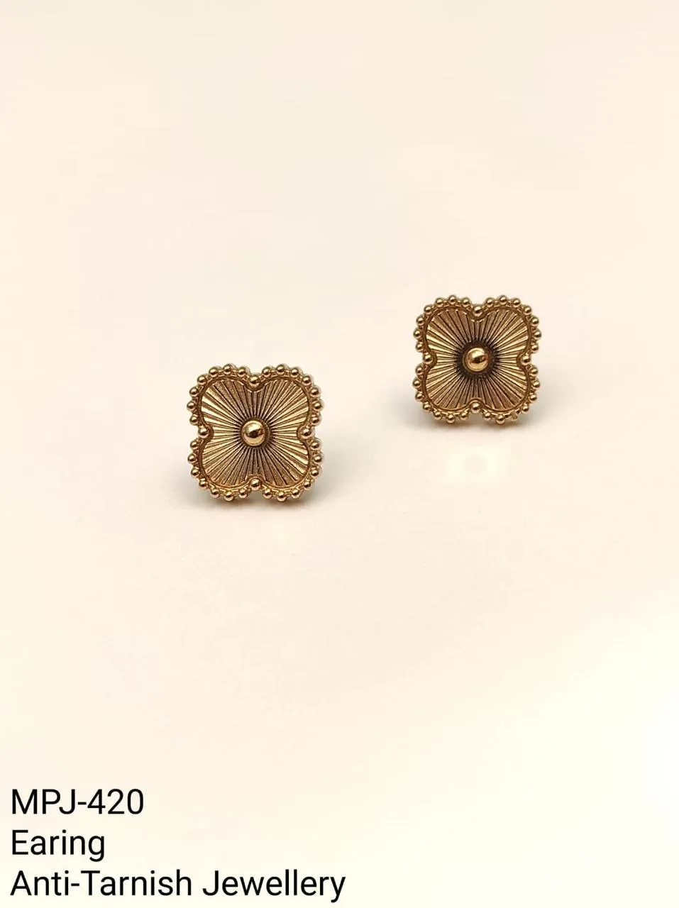 Gold — Small floral stud earrings — Gold