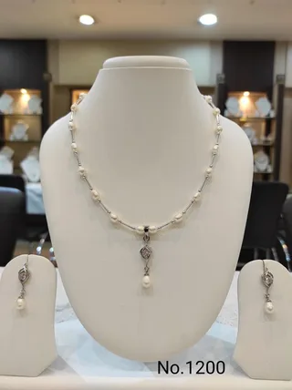 White & Silver — Freshwater Pearl and metal pendant necklace with matching earrings