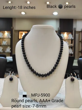 Black pearl necklace with matching earrings