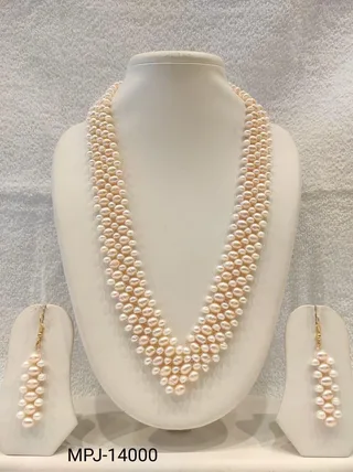 White — Multi-strand Freshwater Pearl bead necklace with matching earrings