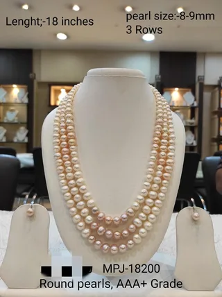 Triple strand pearl necklace with matching earrings