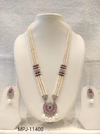 White & Purple — Multi-strand Freshwater Pearl necklace with matching earrings